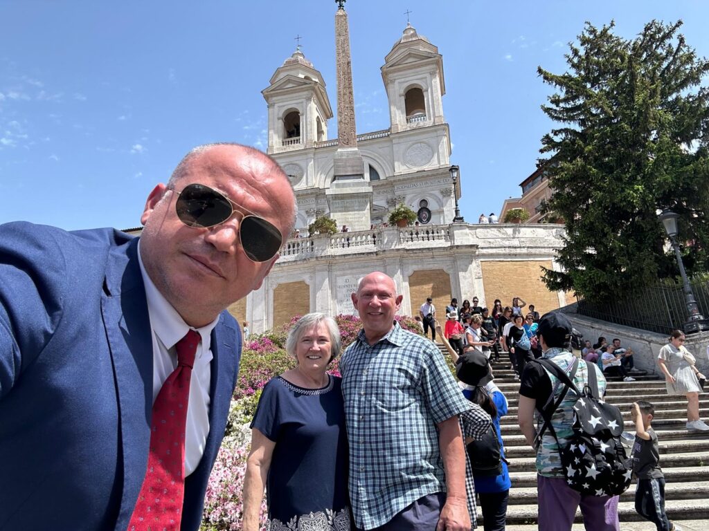 Luxury limousine parked in Rome near ancient architecture
